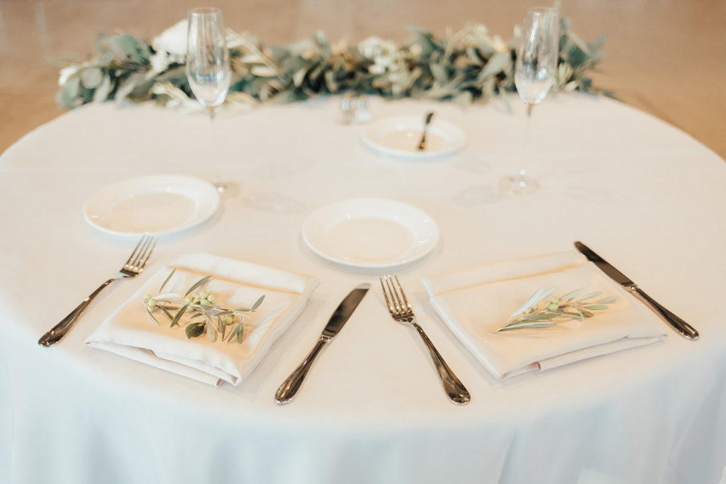 Place setting at Clayton House wedding in Scottsdale, Arizona. Cacti elements paired with a neutral palette.