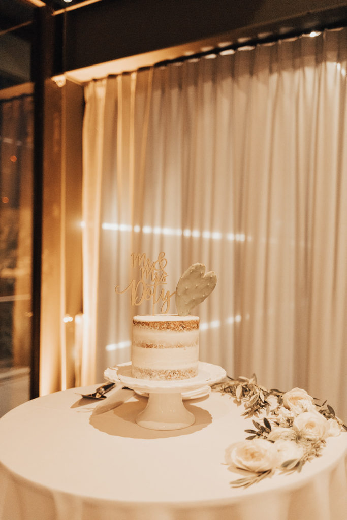 Naked cake at Clayton House wedding in Scottsdale, Arizona. Cacti elements paired with a neutral palette.