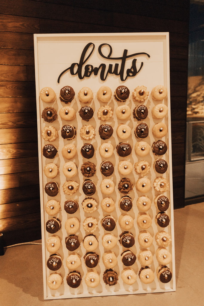 Donut wall at Clayton House wedding in Scottsdale, Arizona. Cacti elements paired with a neutral palette.