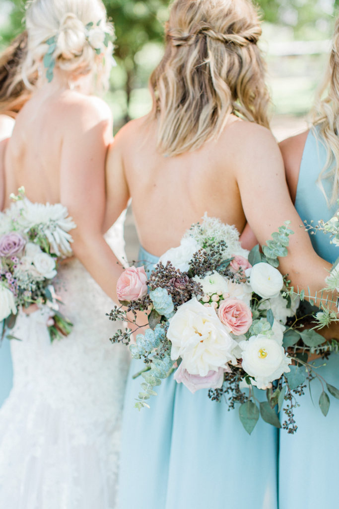 Garden style bouquets of soft palette of pinks, white, and greenery by Array Design, Phoenix, Ariziona. Photographer: Katelyn Cantu