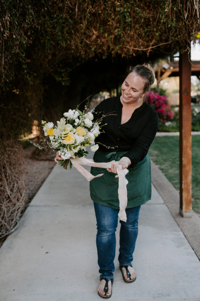 Allison of Array Design. Spring wedding styled shoot at Shenandoah Mill, Gilbert, Arizona. Featuring soft floral designs of white and shades of yellow with greenery by Array Design, Phoenix, Arizona.