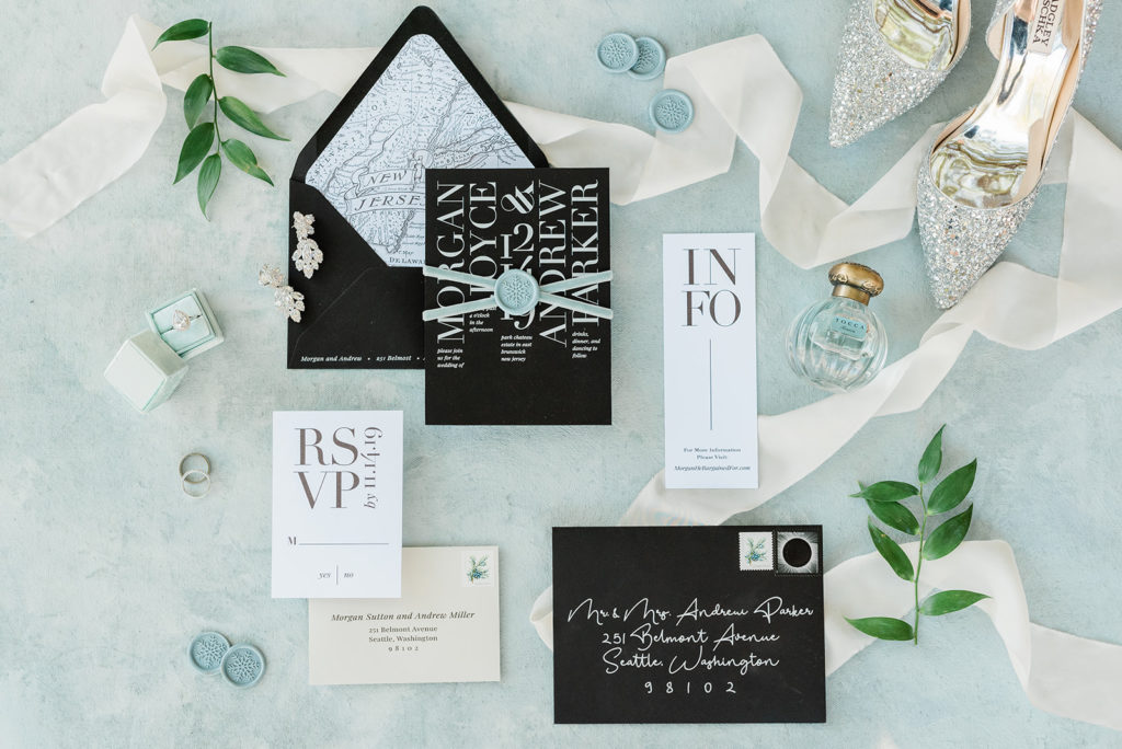 Wedding invitation suite and wedding details with floral accents provided by Array Design, Phoenix, Arizona. Photo by Jen Larsen.
