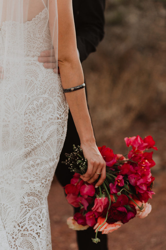 Bougainvillea inspired Arizona wedding with bright floral arrangements and mountain views at this desert wedding. Wedding flowers by Array Design, Phoenix, Arizona. Photographer Kristen Hennke.
