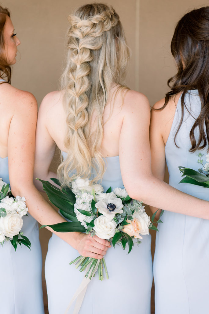 Bridesmaid hair braid detail and bouquet.