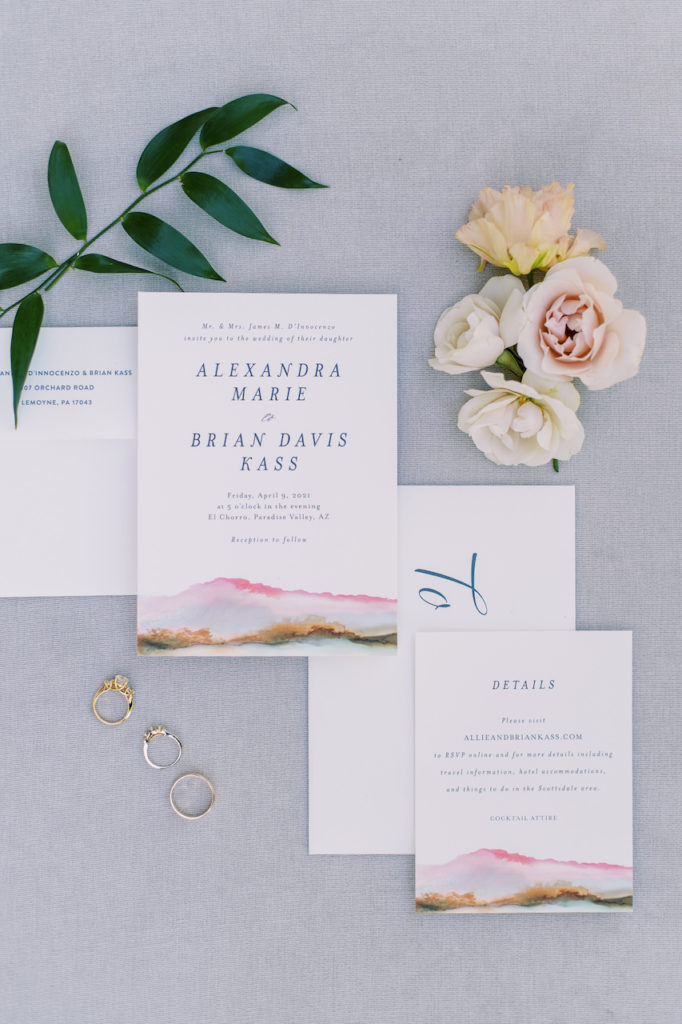 White with desert mountain theme wedding invitations.