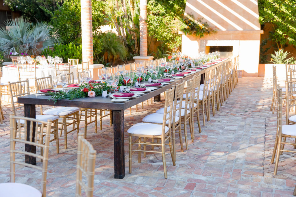 Long farmhouse reception table for wedding at Royal Palms.