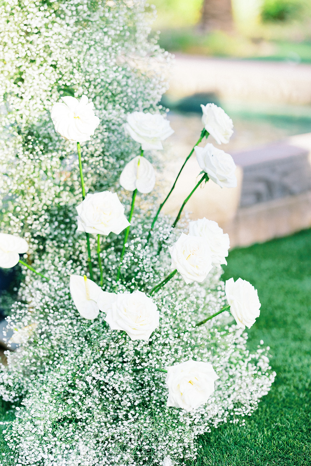 White flowers wedding ceremony floral installation.