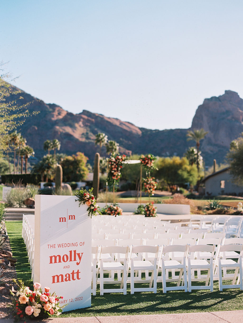 Outdoor wedding ceremony at Mountain Shadows with welcome sign.