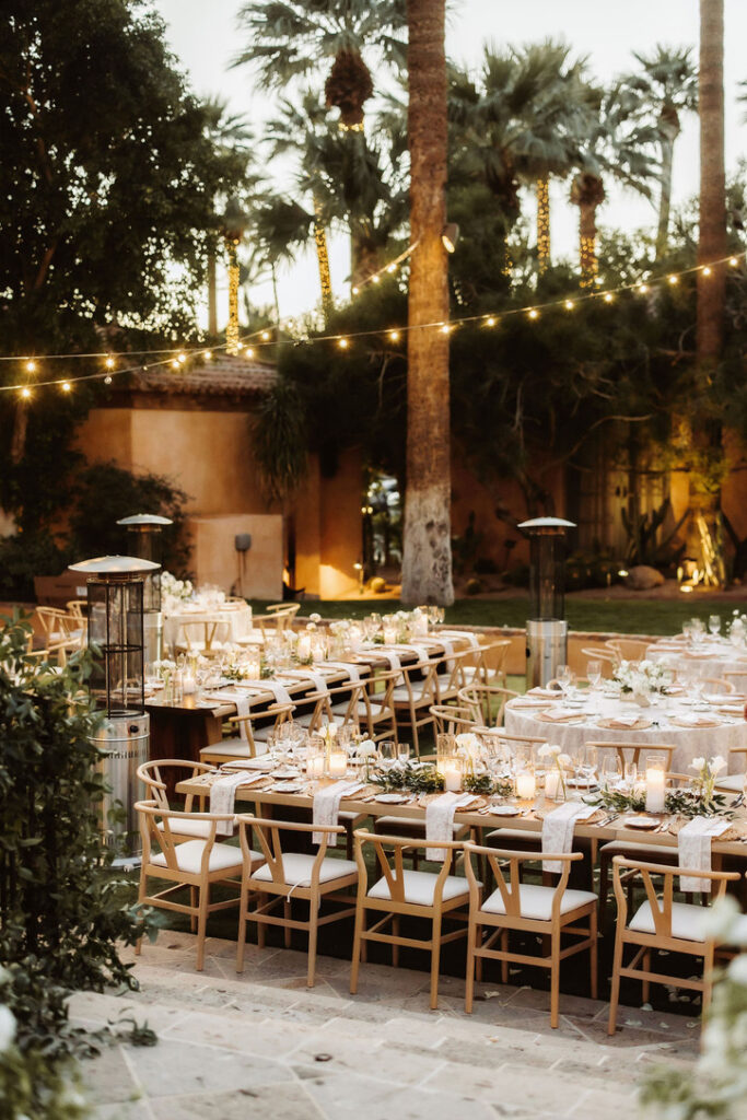 Royal Palms outdoor wedding reception space with long tables and round tables.
