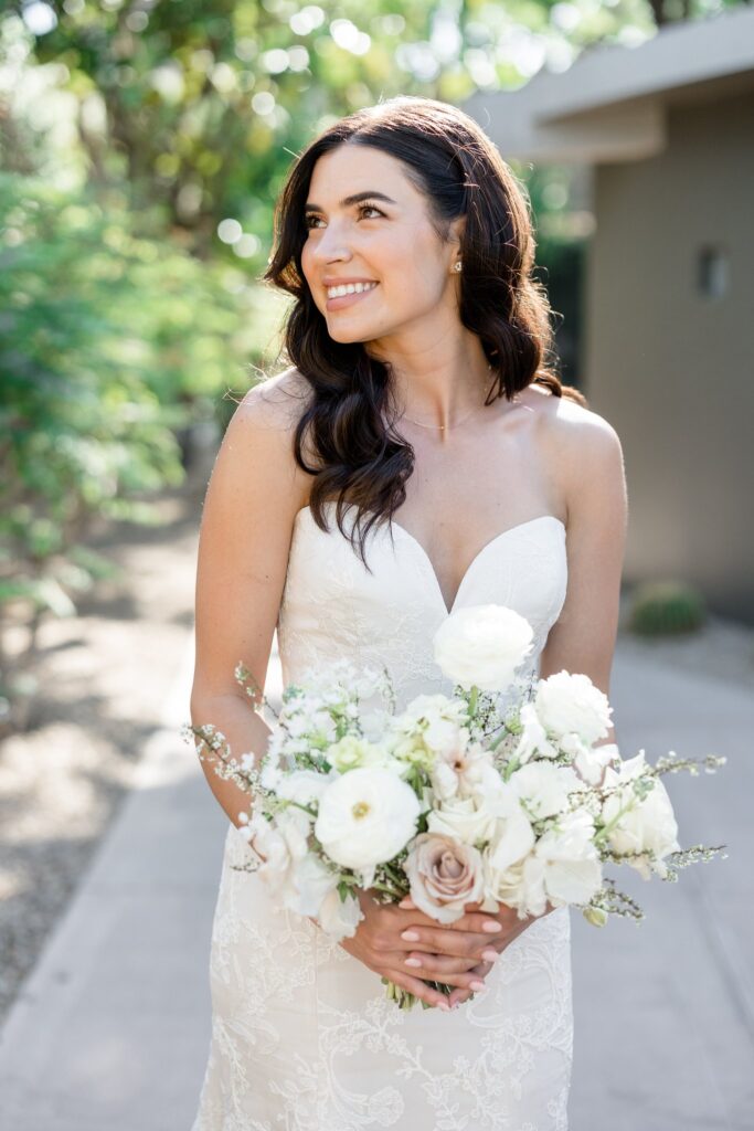 Dainty white flowers bridal bouquet with hint of blush.