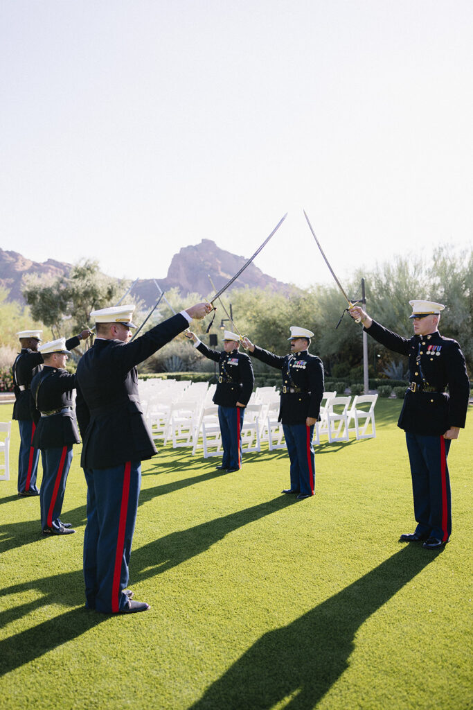 Military sword raised tunnel at outdoor wedding ceremony at El Chorro.