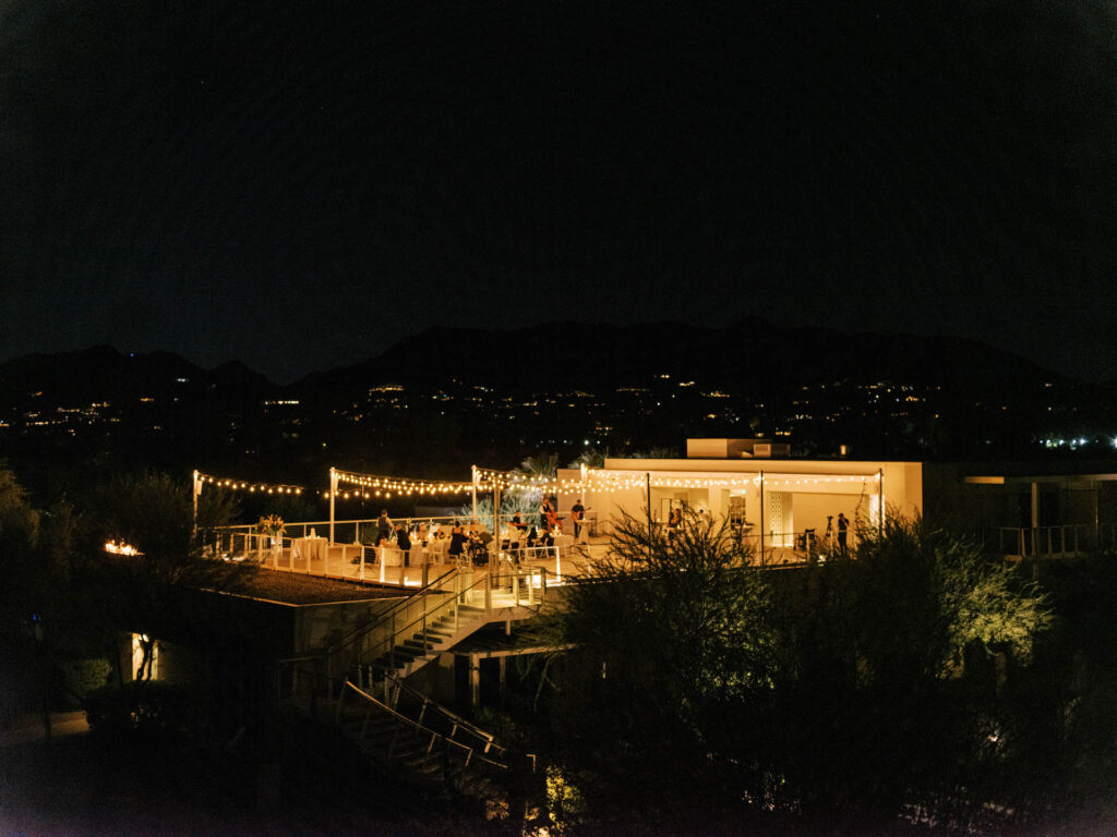 Evening wedding reception on Mountain Shadows patio.