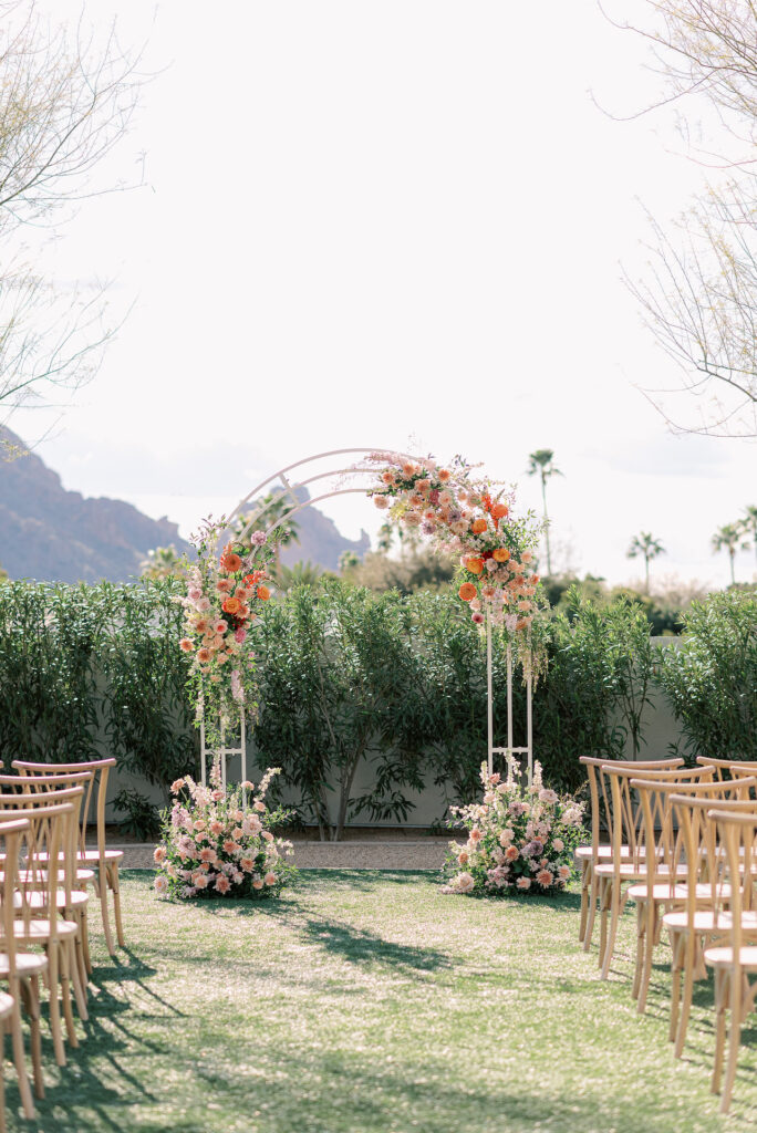 Wedding ceremony arch in outdoor wedding ceremony at Andaz Resort.