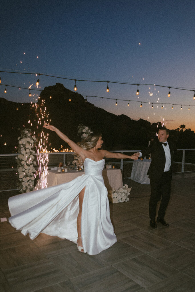 Bride and groom dancing during wedding reception.