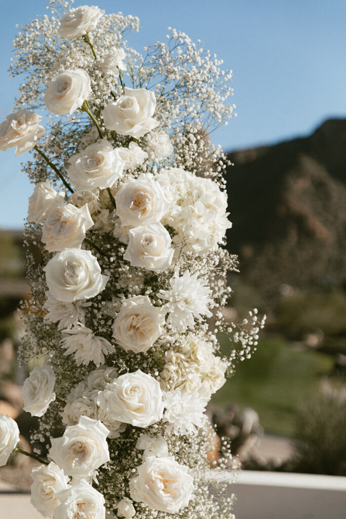 White flowers and baby's breath flowers details of floral column.