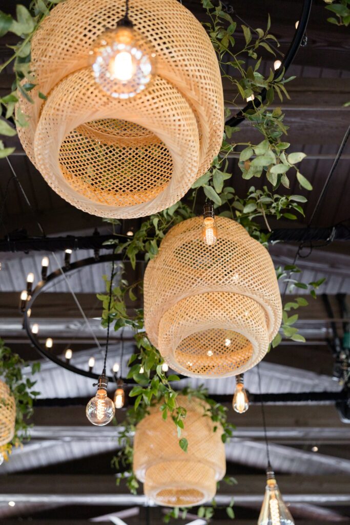 Wicker lampshades hanging from ceiling at Windgate Ranch.