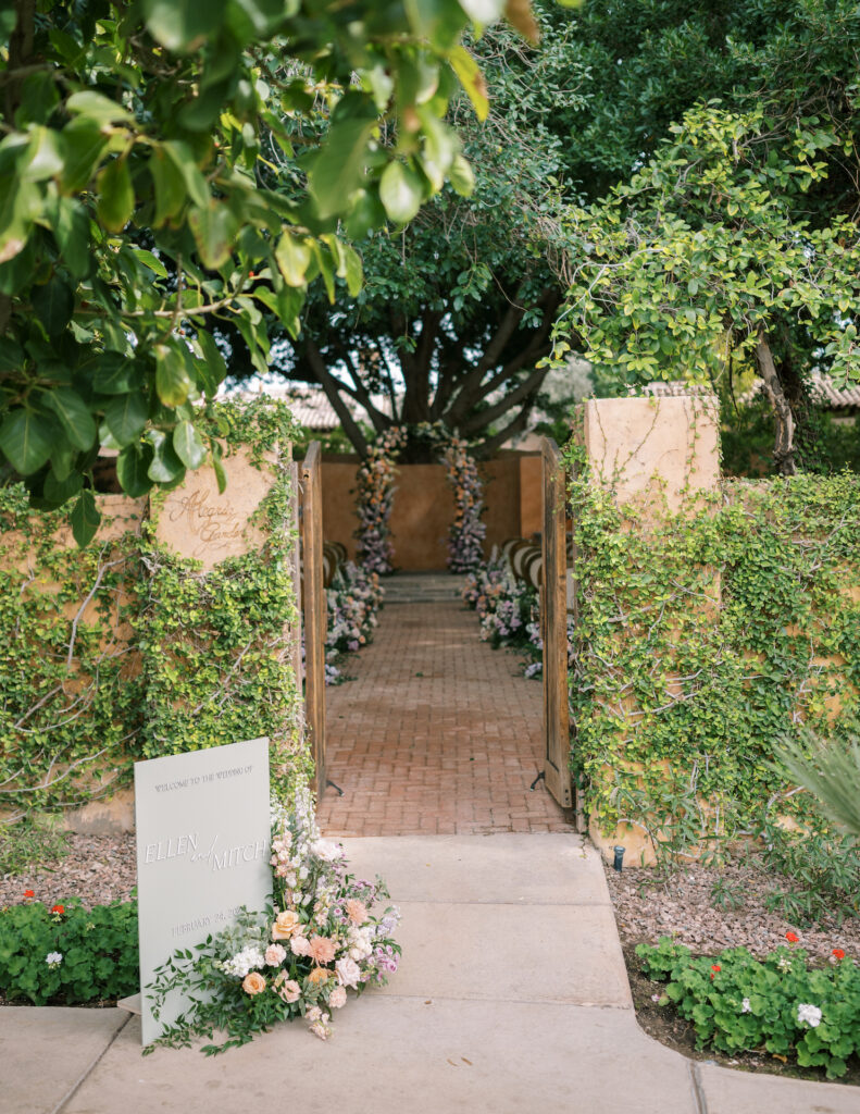 Entrance to Royal Palms outdoor ceremony space through doors.