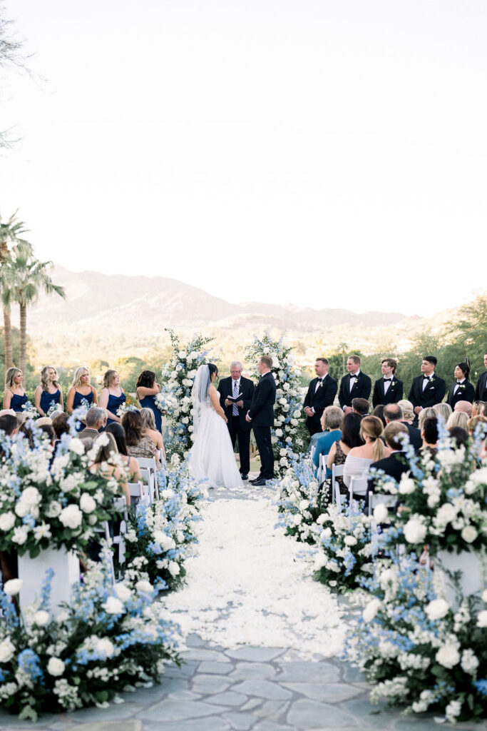 Bride and groom in ceremony altar space at Sanctuary Resort.
