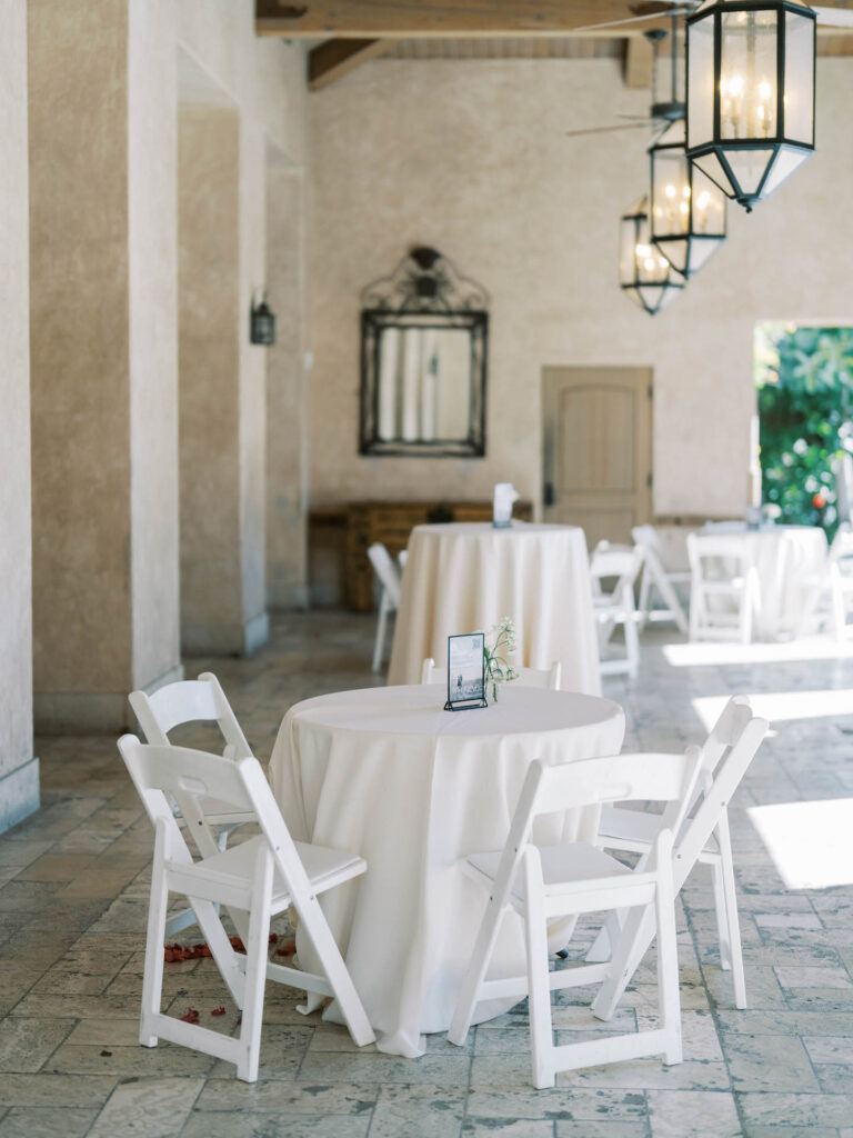 Royal Palms outdoor space with wedding cocktail hour tables set.