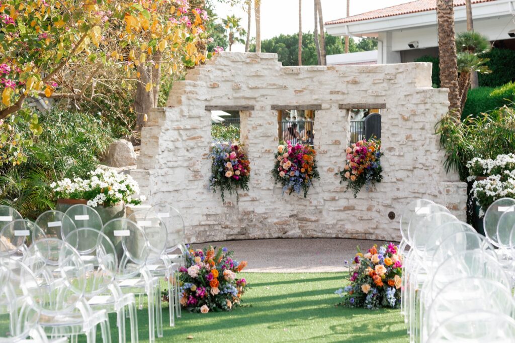 The Scott wedding ceremony floral design with ground floral and window floral.